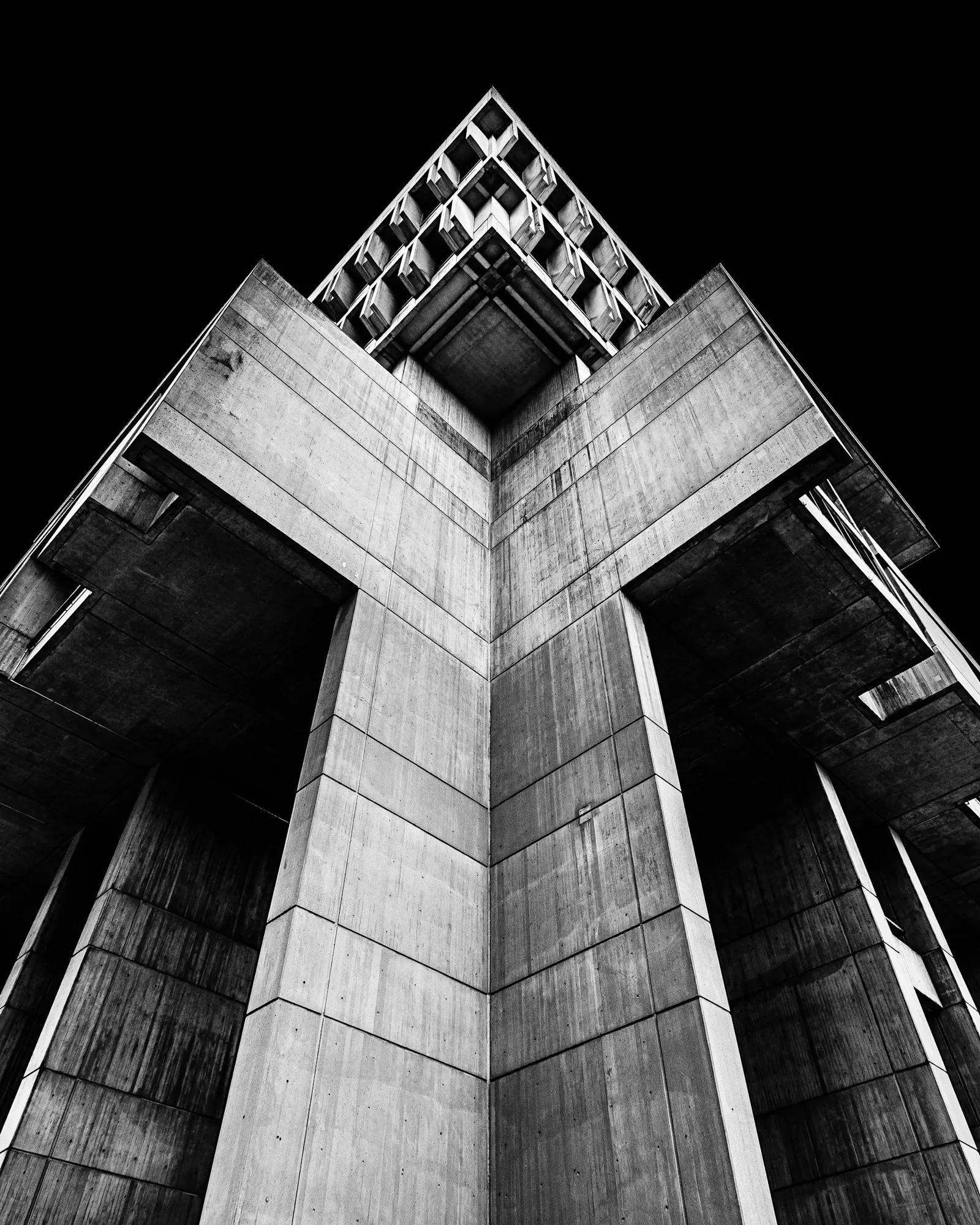 Geometric concrete architecture in soft monochrome light